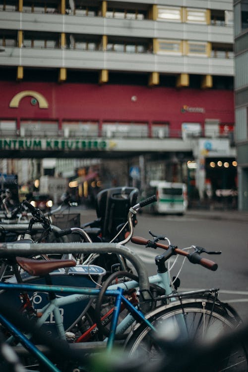 Black and Blue Bicycle Parked on the Street