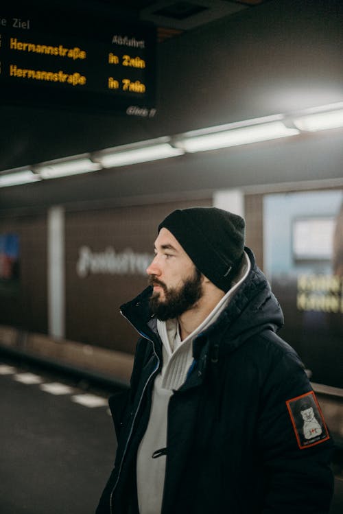 Man in Black Jacket and Black Knit Cap