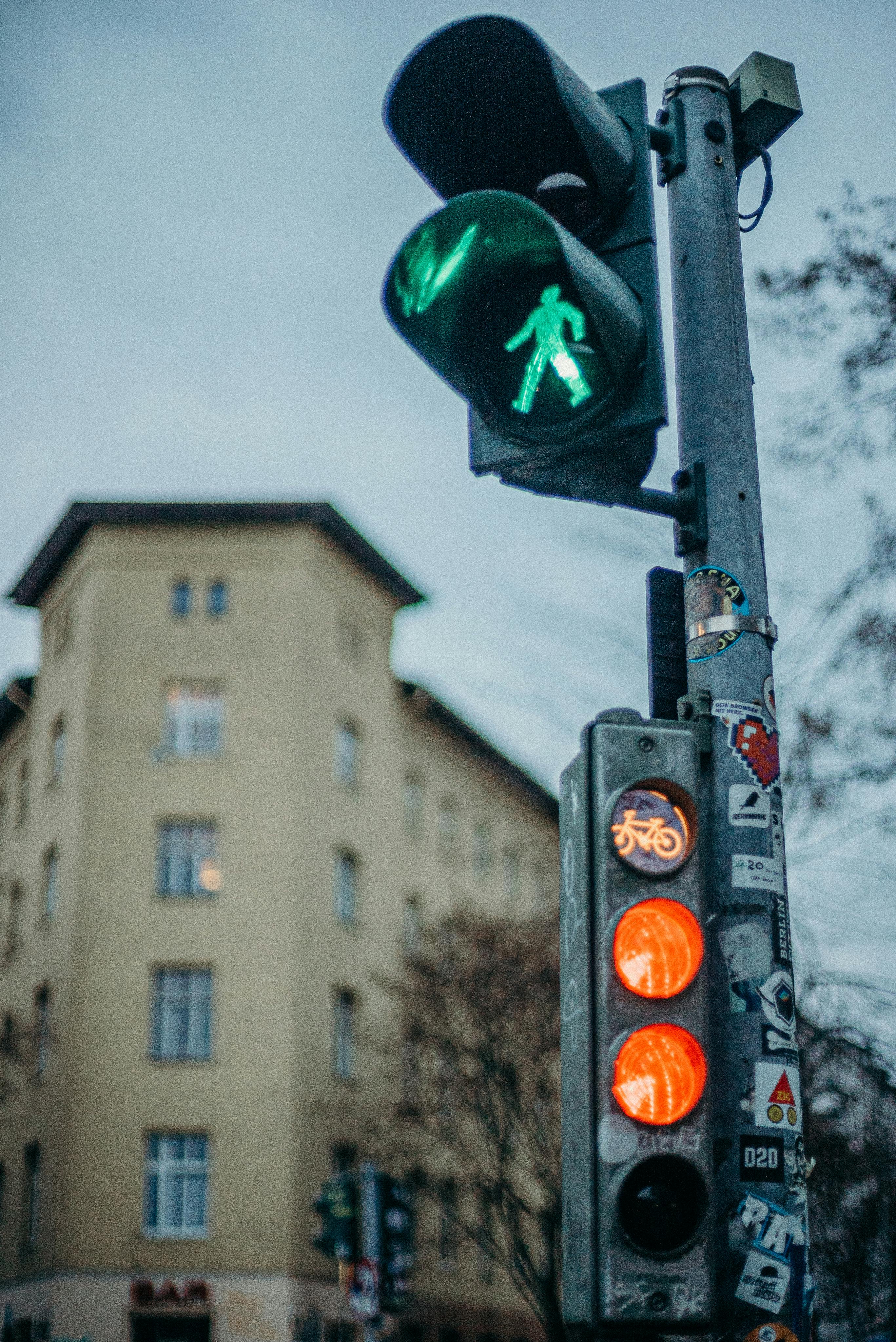 black traffic light with green light