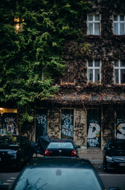Cars Parked in Front of Building · Free Stock Photo