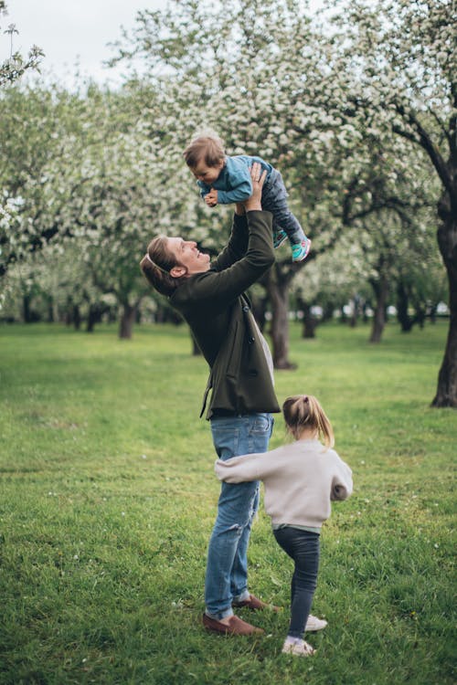 Father With his Children at a Park