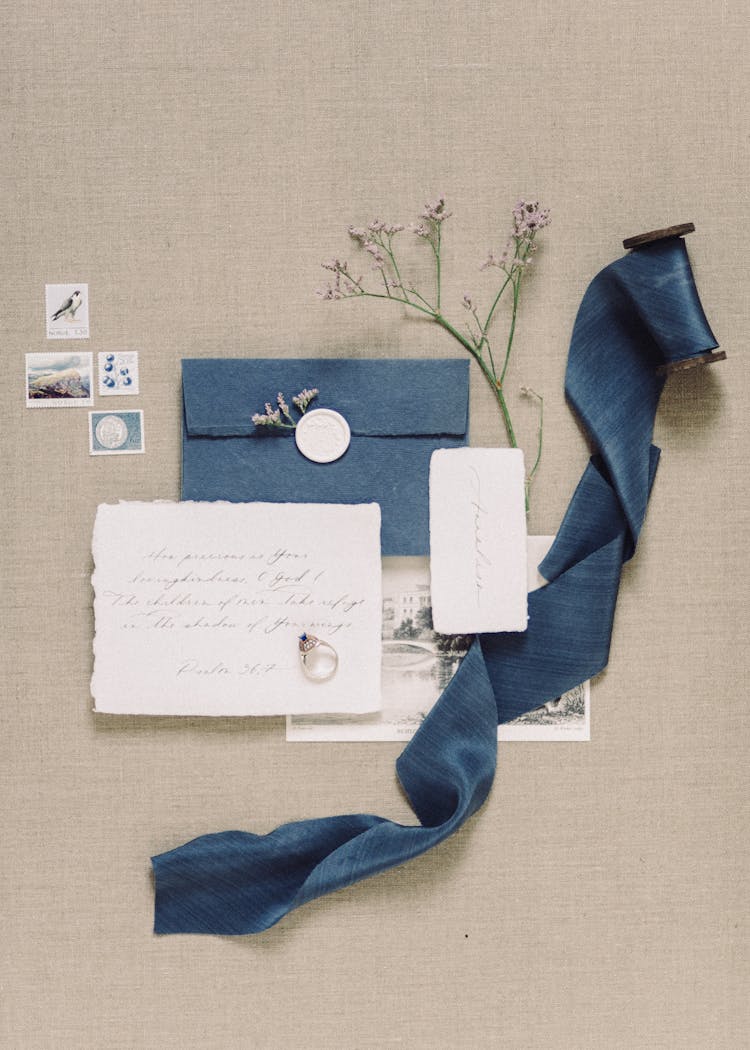 Blue Envelope Beside The Blue Ribbon