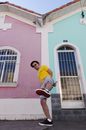 Boy in Yellow T-shirt and Red Shorts Jumping on Mid Air
