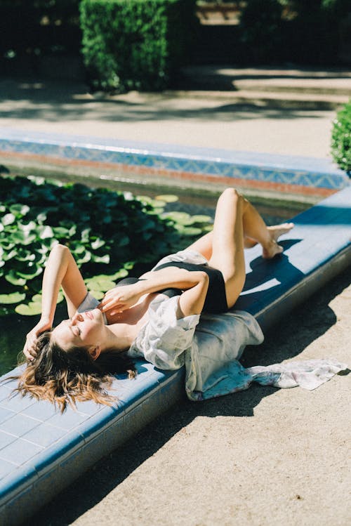 Free Woman Wearing a Black Swimsuit Stock Photo