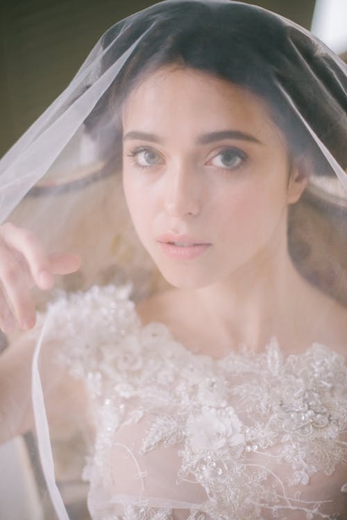 Woman in White Floral Wedding Dress