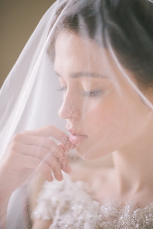 A Woman Wearing a White Veil
