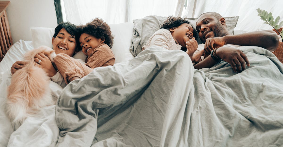 Happy Family in Bed