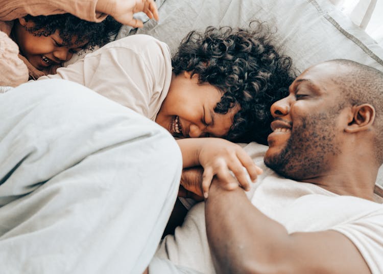 Happy Black Children Playing With Dad