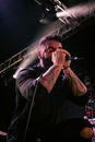 Man in Black Long Sleeve Shirt Singing