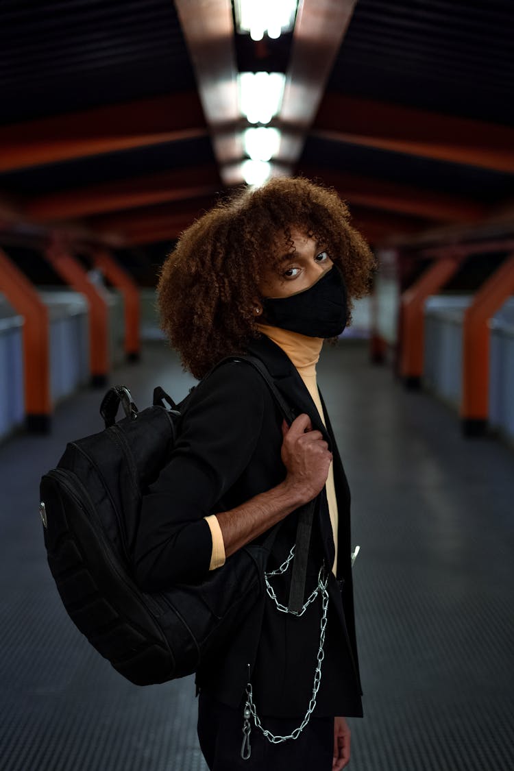 Young Black Man In Protective Mask In Subway