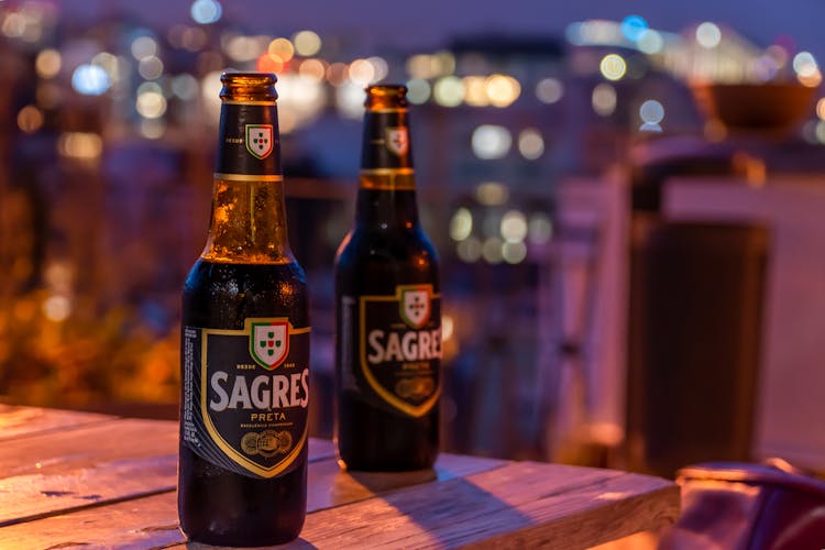 Close Up Of Beer Bottles On Table