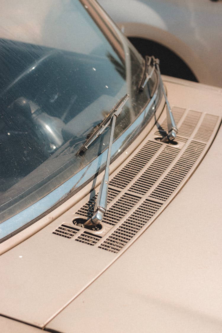 Vintage Car Wipers And Windshield In Sunlight