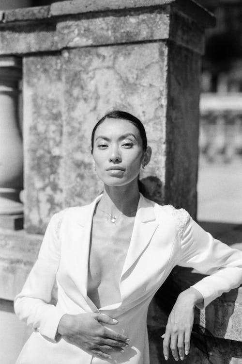 Grayscale Photo of Woman in White Dress Shirt