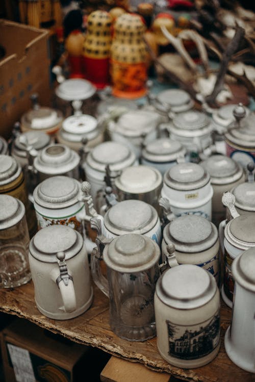 White Ceramic Jars on Brown Wooden Table