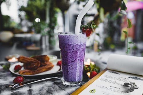 Purple Smoothie on a Clear Drinking Glass