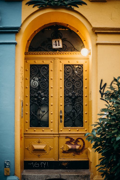 Blue Wooden Door With Black Steel Door Knob