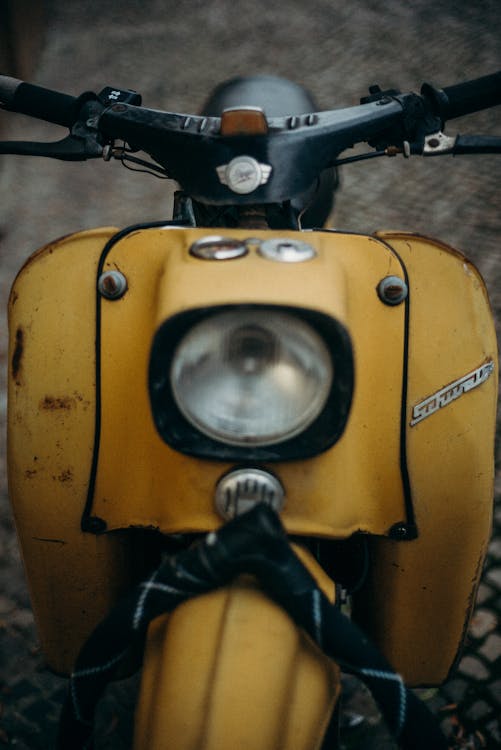 Yellow and Black Motorcycle With Black Handle Bar
