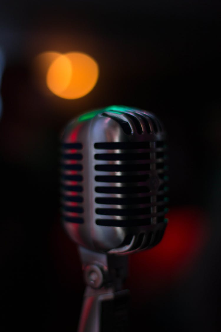 Modern Microphone On Stage In Darkness