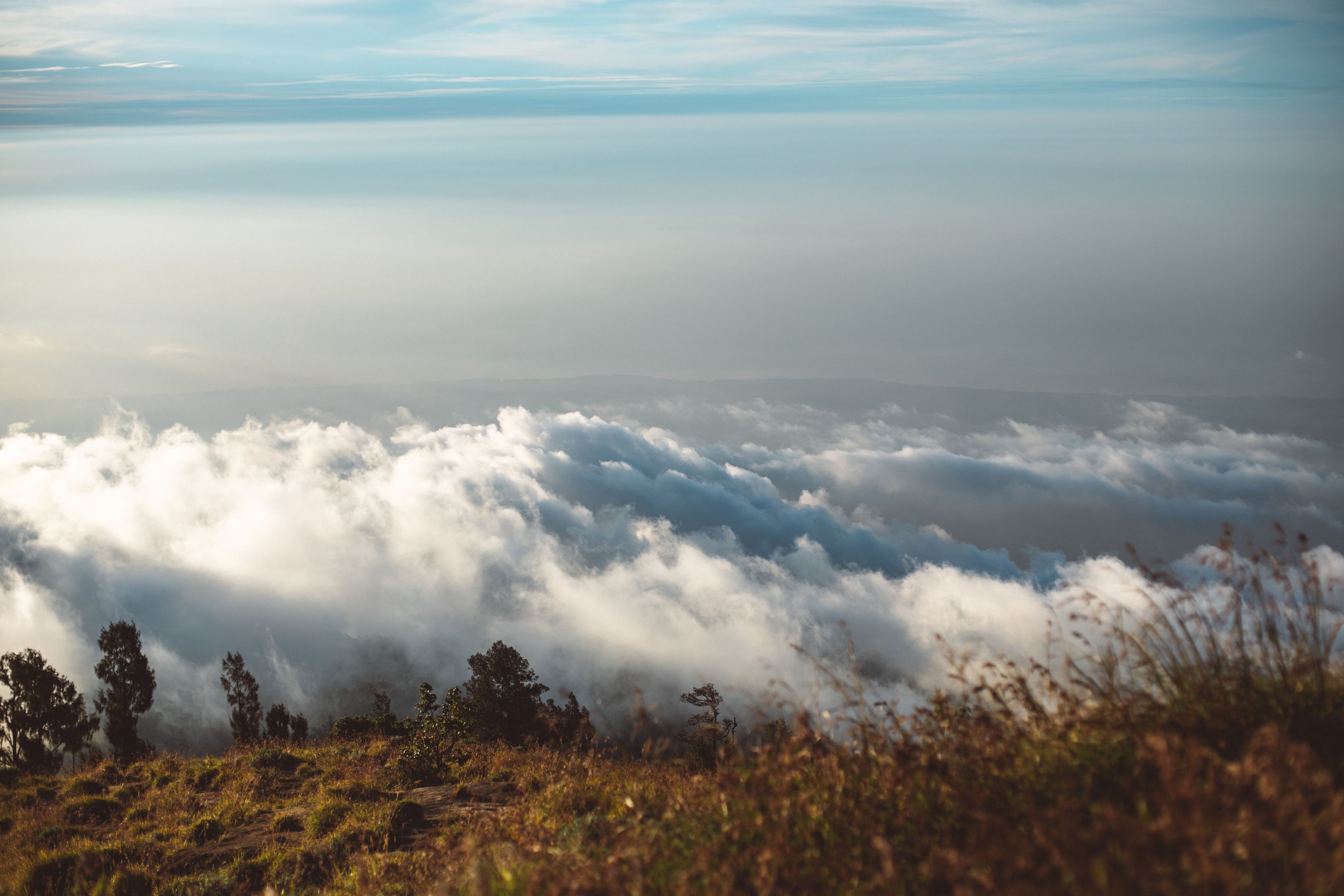 Clouds Hanging Over Terrain In Overcast Weather Free Stock Photo clouds-hanging-over-terrain-in-overcast-weather-free-stock-photo
