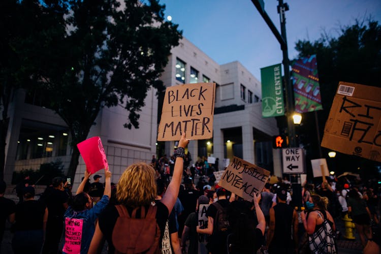 Protesters Holding Signs