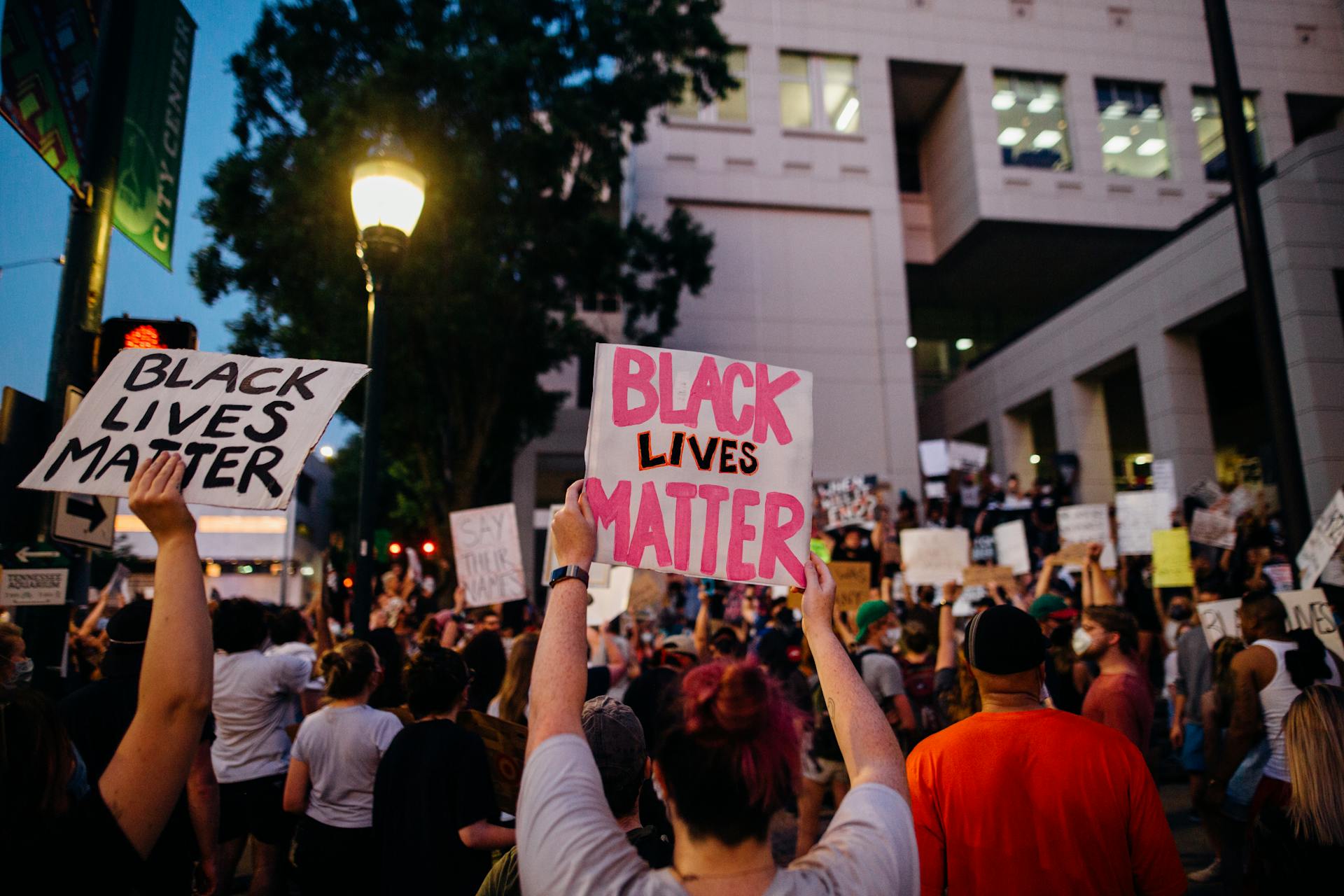 Protesters Holding Signs