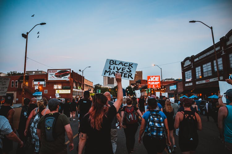 Protesters Walking On Street