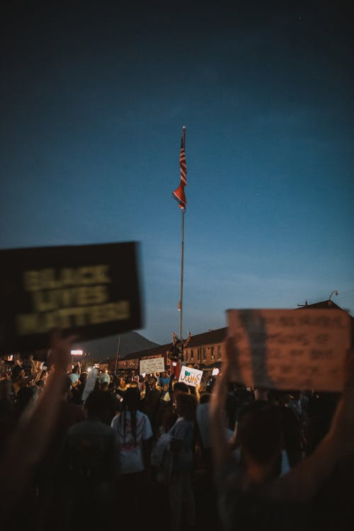 Free Protesters Holding Signs Stock Photo