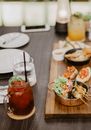 Meat with salad and drinks on table in cafe