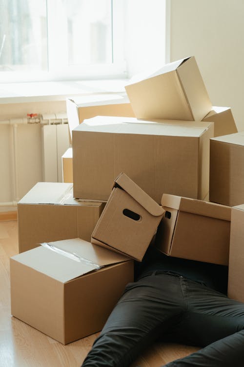 Free Brown Cardboard Boxes on White Floor Stock Photo