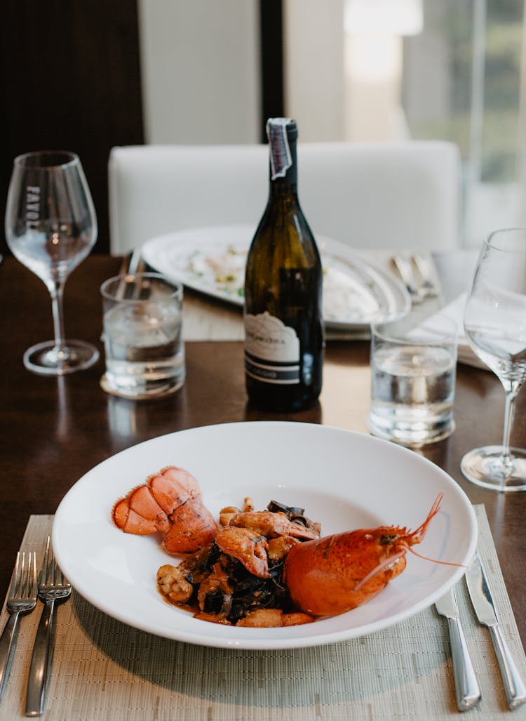 Delicious Appetizer With Boiled Lobster And Wine