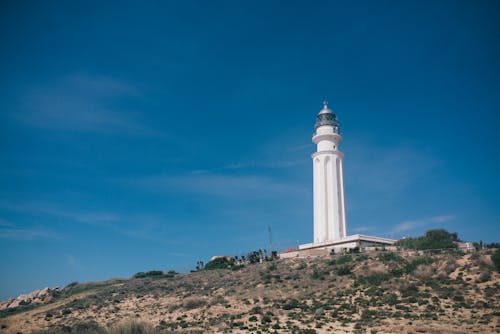 White Concrete Tower Under Blue Sky