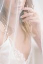 Woman in White Lace Wedding Dress