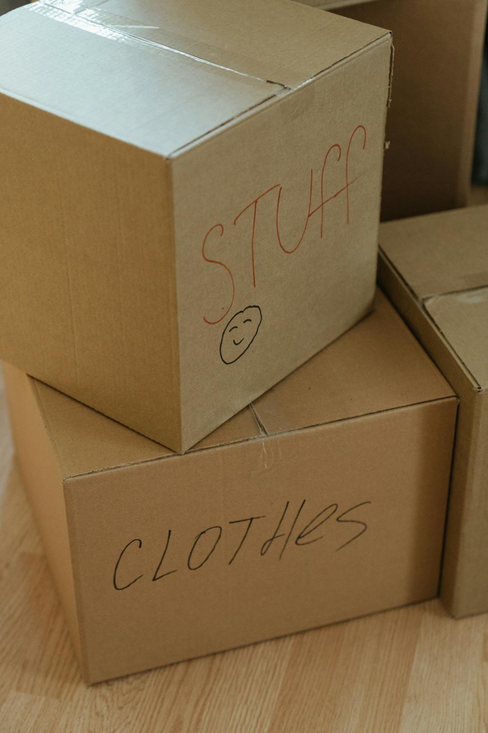 Best Ways to Store Clothes in a Garage 3 box with labels