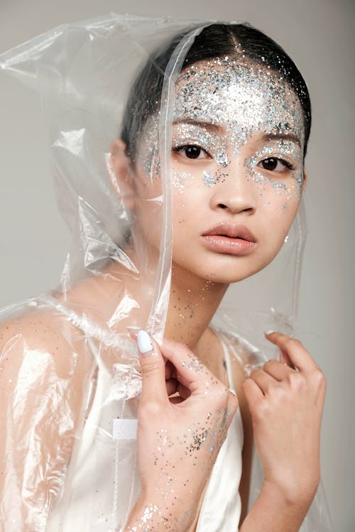 Woman with Glitter Make Up on her Face