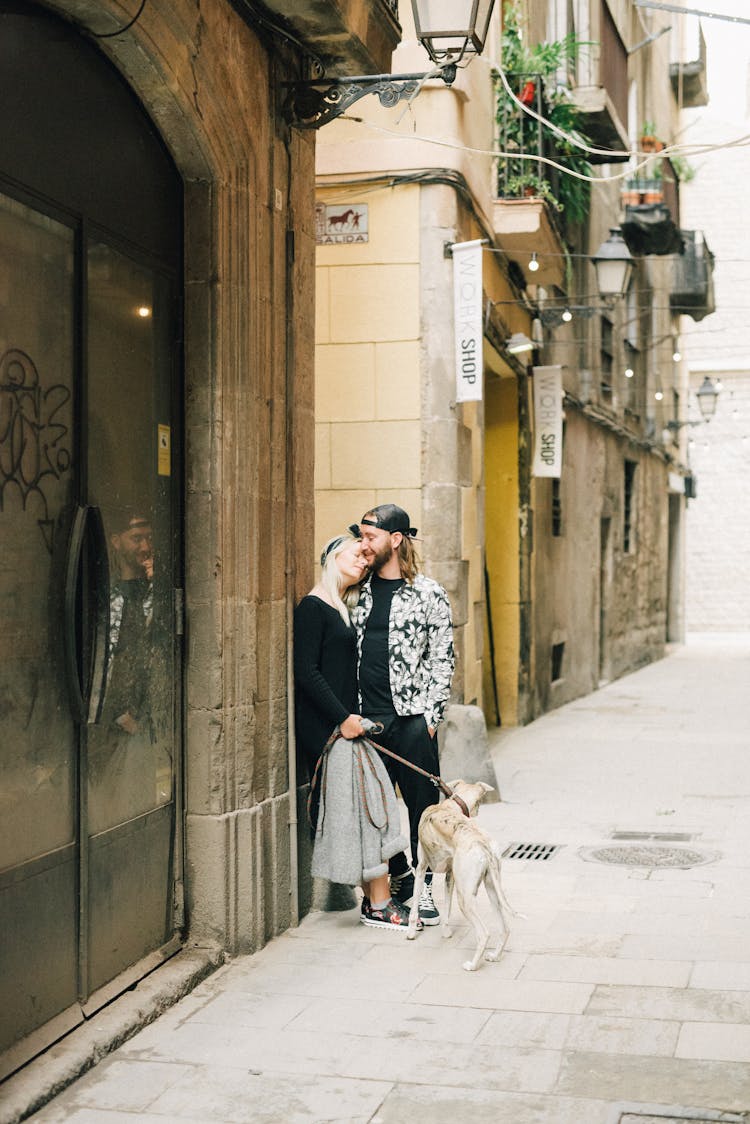 A Romantic Couple With A Dog