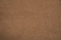 Brown Textile on Brown Wooden Table
