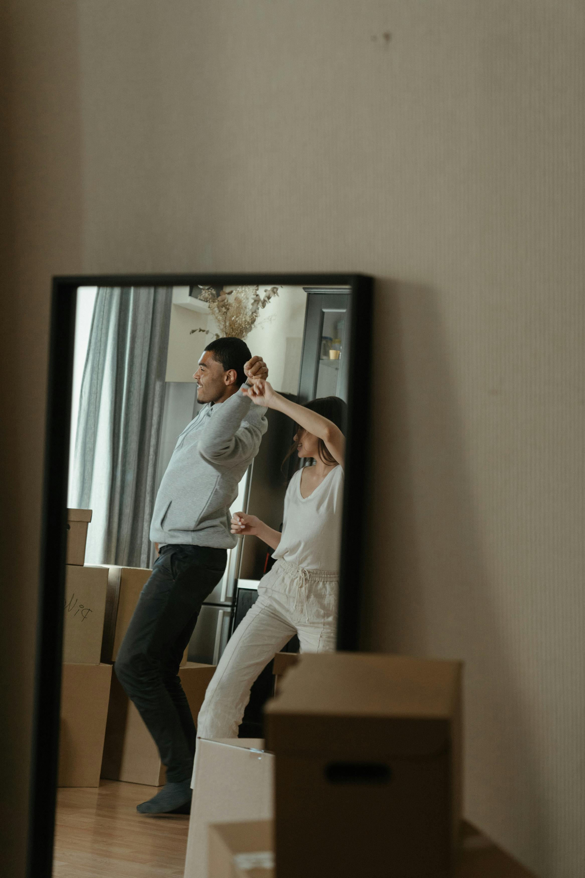 Man In White Dress Shirt And Black Pants Standing Beside Woman In White ...