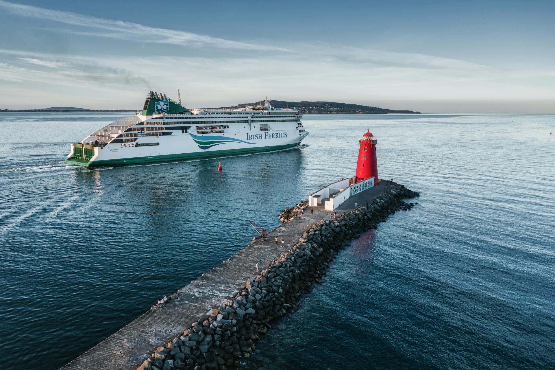 An Irish Ferries ship sails past the iconic Poolbeg Lighthouse in Dublin Bay.