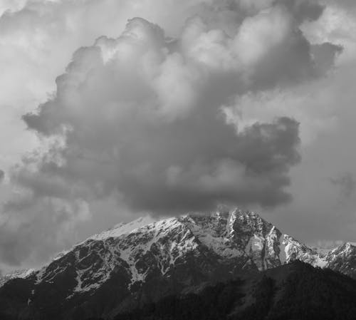 Grayscale Photography of Snow Covered Mountain 