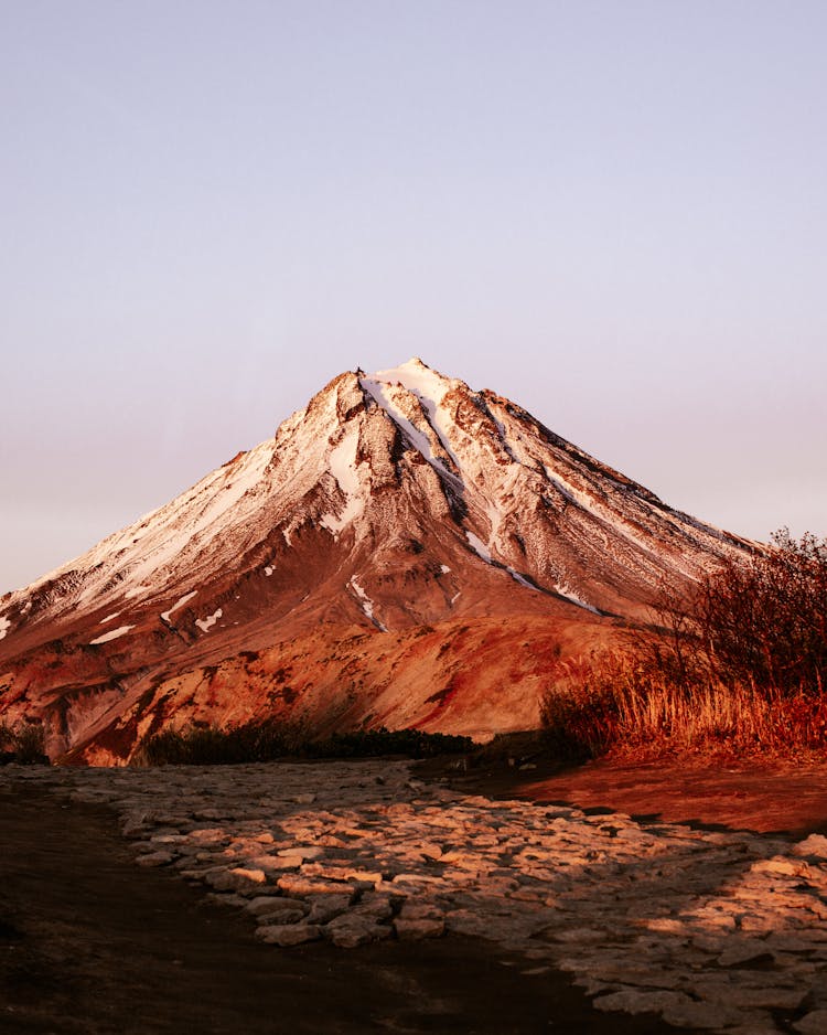 Snowy Mountain Peak Against Clear Sky