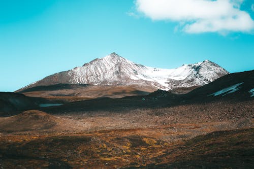 Landscape of rocky mountain and blue sky above