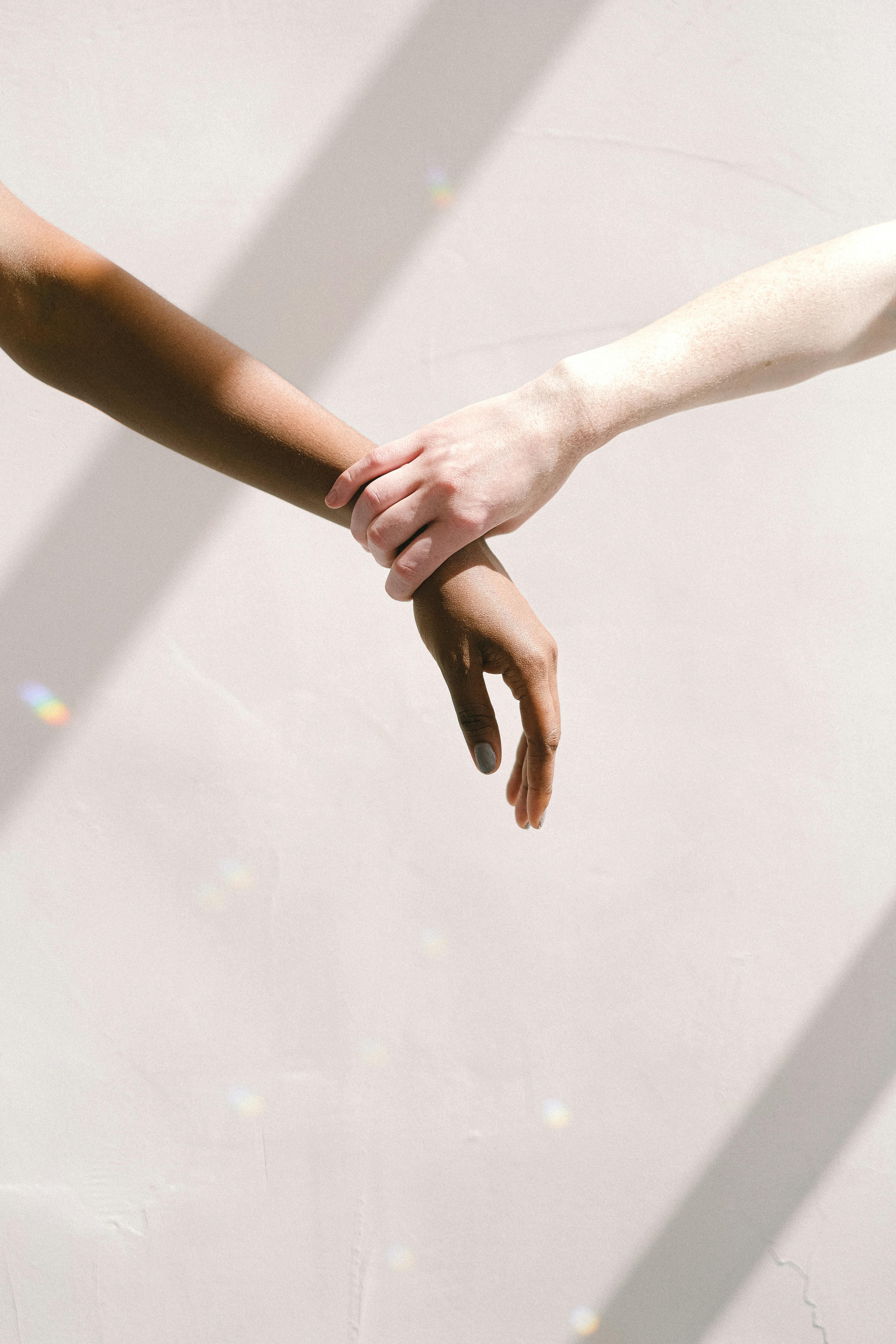 Hand Holding Someone by the Wrist · Free Stock Photo