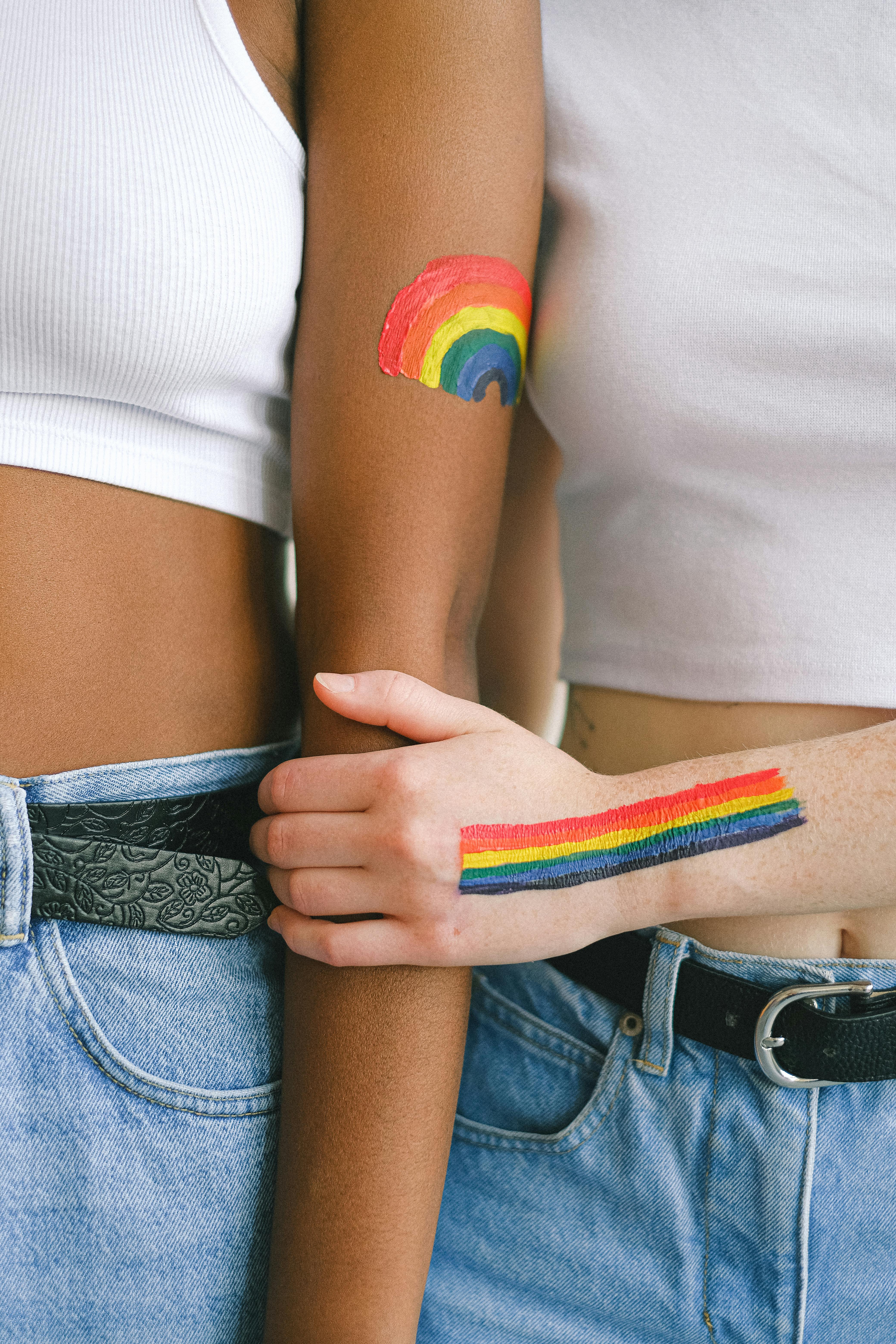 women with gay pride body paint