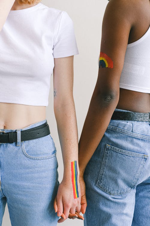 Free Mujeres Con Pintura Corporal Del Orgullo Gay Stock Photo