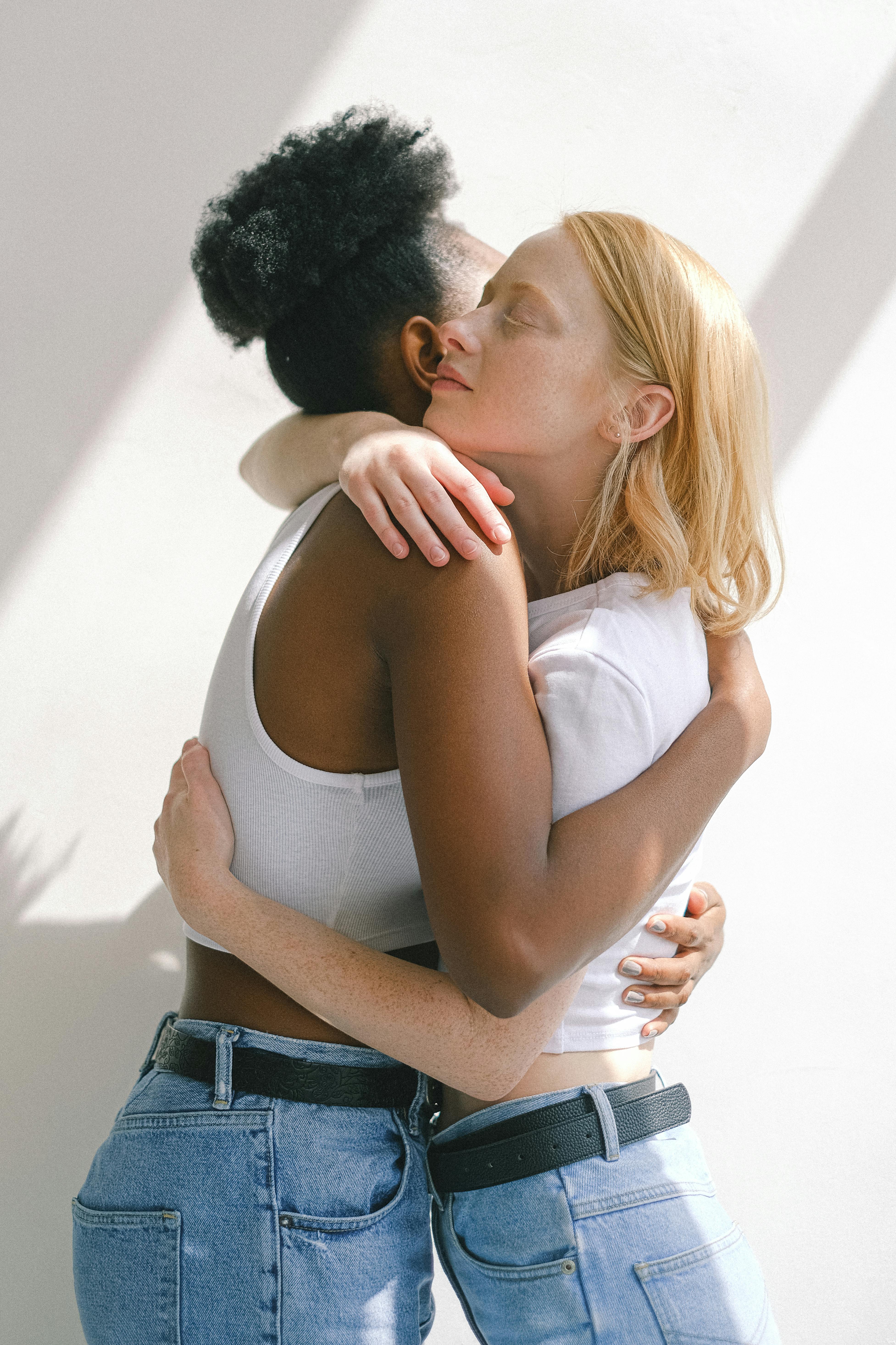 women hugging each other