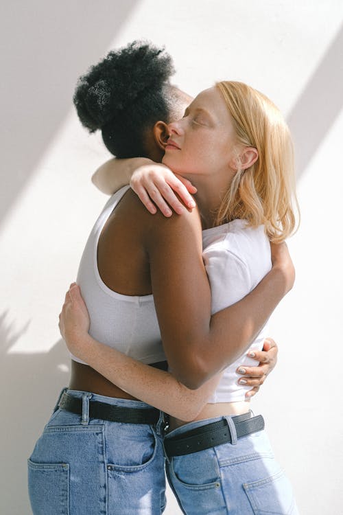 Women Hugging Each Other