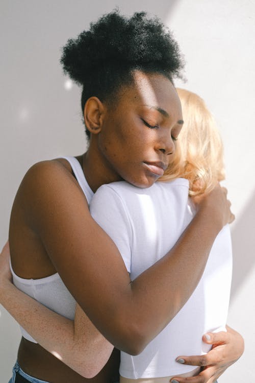 Free Women Hugging Each Other Stock Photo