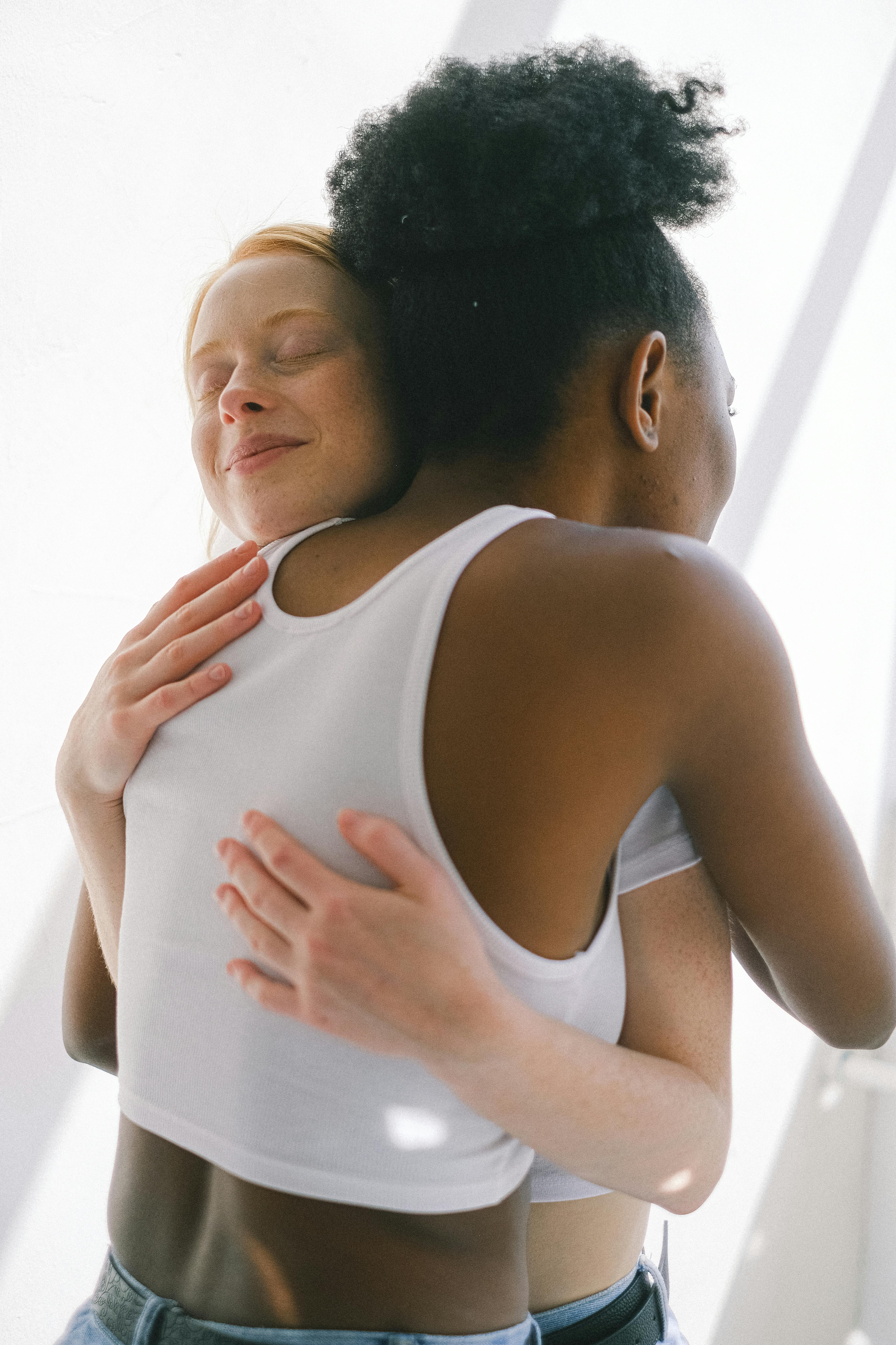 women hugging each other