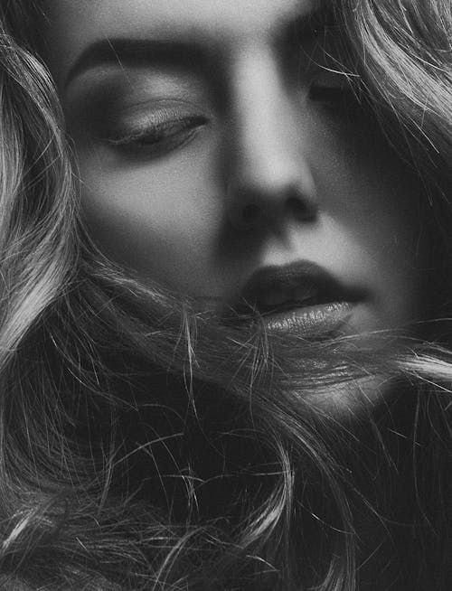 Free  Beautiful Face of a Woman in Grayscale Photography Stock Photo