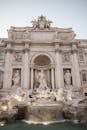 Wonderful Trevi Fountain with graceful statues in front of Palazzo Poli in Rome